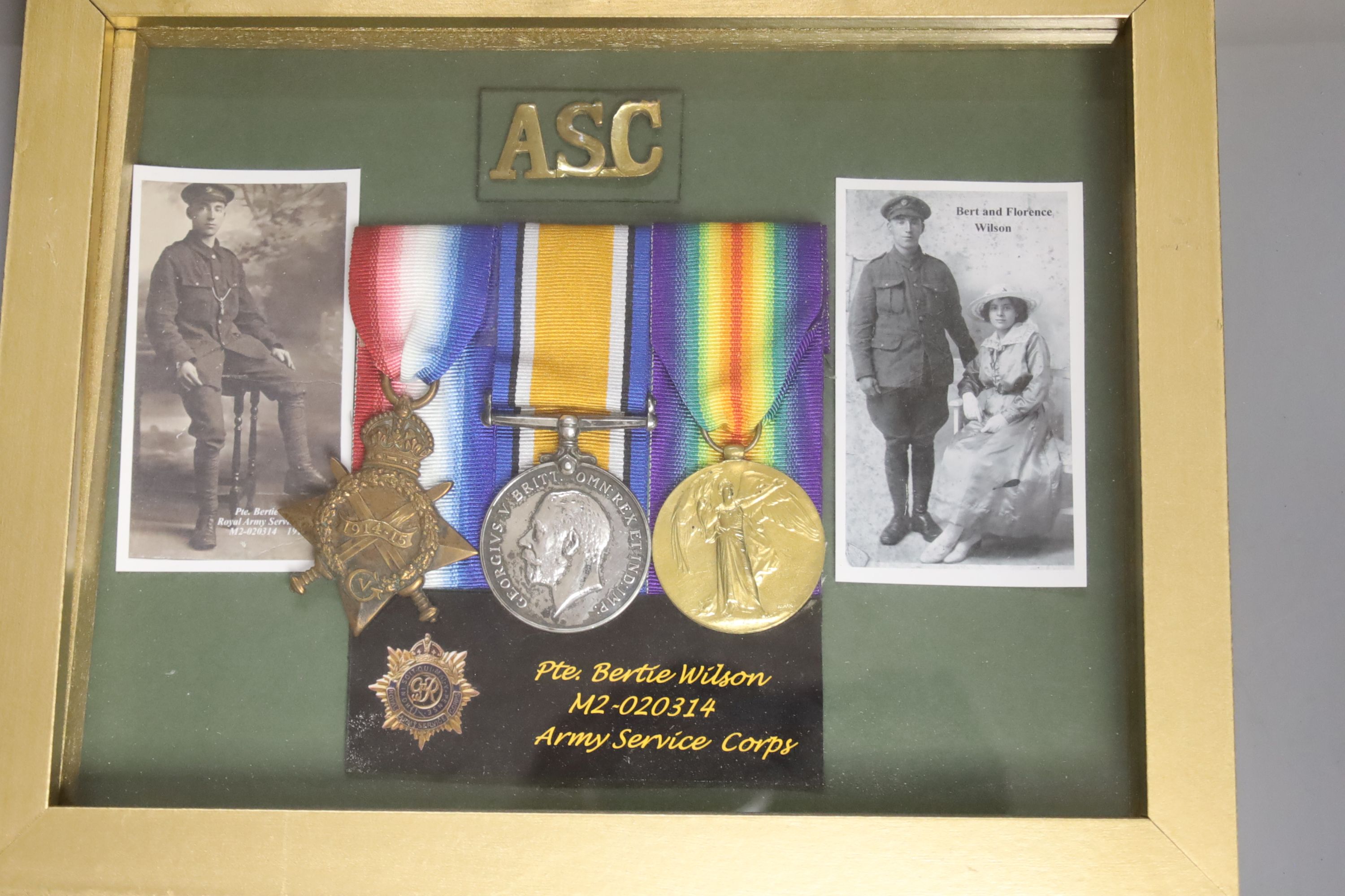 Three framed WW1 medal groups